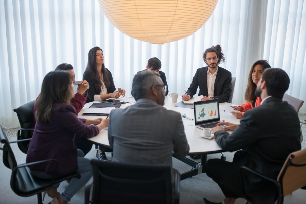 People in the middle of a business meeting.